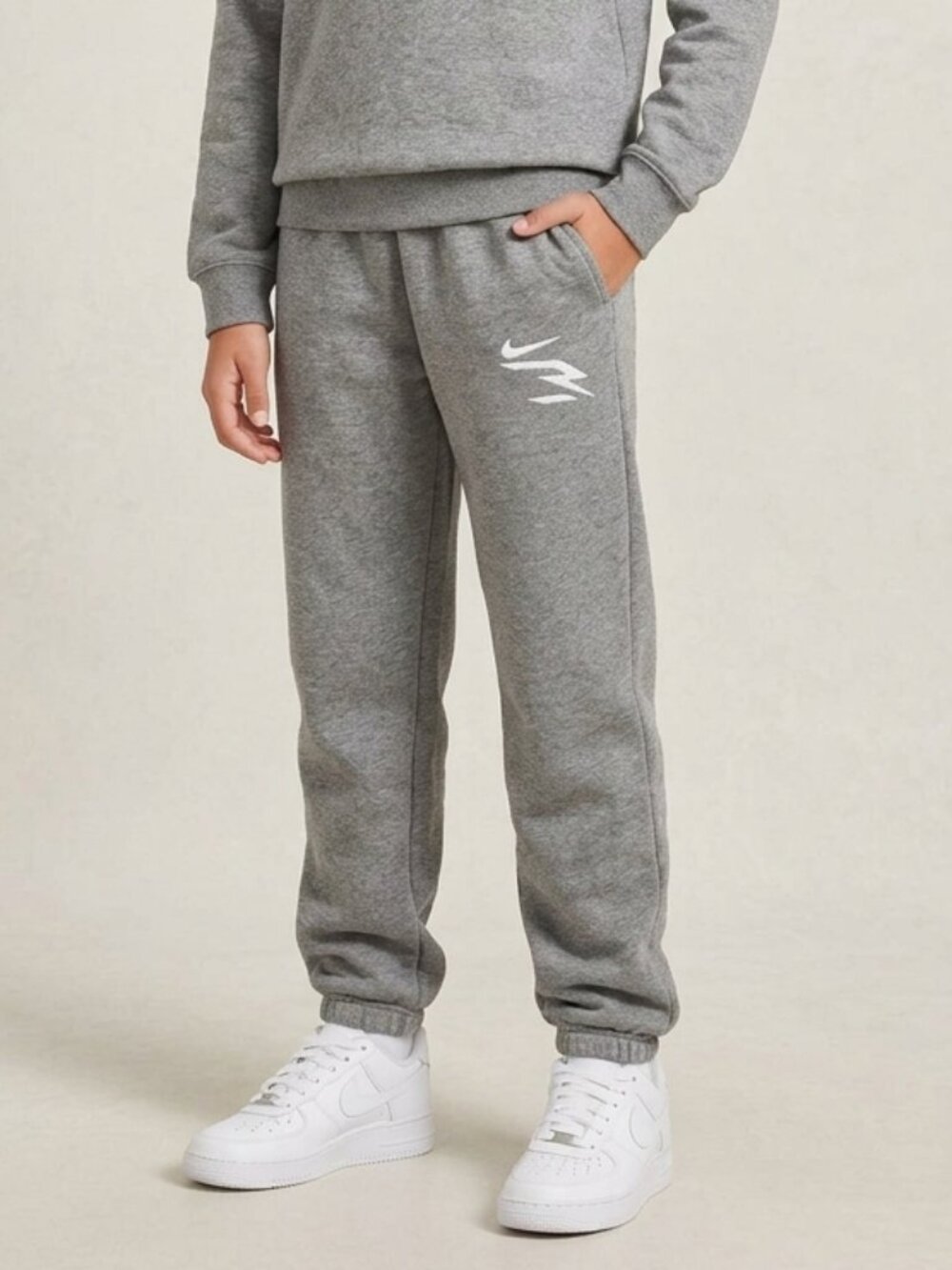 Nike Joggers 3BRAND Boys by Russell Wilson fleece Size Large Gray White Stretchy